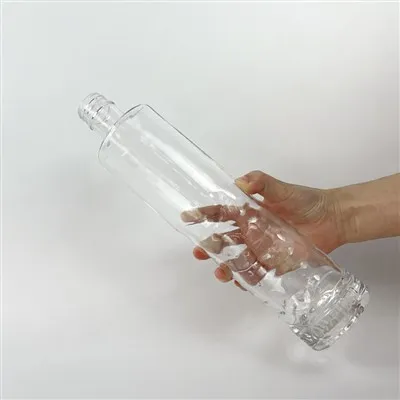 Botella de vino de vidrio desnudo cilíndrica de 700 ml con grabado cóncavo y convexo